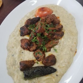 Koftegi - Al Nazik with Beef Tri Tip on top of Eggplant puree - Mediterranean Near Me - Anaheim, California Koftegi - Al Nazik with Beef Tri Tip on top of Eggplant puree - Mediterranean Near Me - Anaheim, California