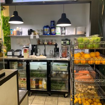 We juicing - Behind the counter. - Juice Bars & Smoothies Near Me - Jamaica, New York We juicing - Behind the counter. - Juice Bars & Smoothies Near Me - Jamaica, New York