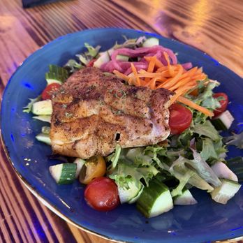 The Peculiar Pub - Citrus Greens salad (entree size) with salmon - Pubs Near Me - Bradenton, Florida