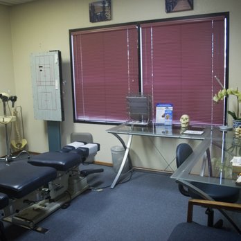 Shasta Spine Specialists - Examination and X-ray room with traction treatment table and educational tool! - Sports Medicine Near Me - Redding, California Shasta Spine Specialists - Examination and X-ray room with traction treatment table and educational tool! - Sports Medicine Near Me - Redding, California