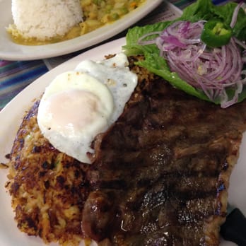 Pollos Inti Restaurant - Tacu Tacu Beef w/ added fried egg (bottom) and Cau Cau Peruano (top) - Latin American Near Me - Sterling, Virginia