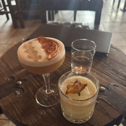 To the left is I Stay Up Late . On the right is the Silence Glaive Surprise my partner got. Great drinks!
