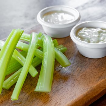 The Wing Experience - celery and dips on a cutting board - Chicken Wings Near Me - Tarentum, Pennsylvania The Wing Experience - celery and dips on a cutting board - Chicken Wings Near Me - Tarentum, Pennsylvania