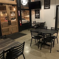 Pioneer Pizza - Front door & dining area.