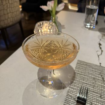 Herb & Omni - Champagne in a vintage coupe glass - Cocktail Bars Near Me - Whitefish, Montana Herb & Omni - Champagne in a vintage coupe glass - Cocktail Bars Near Me - Whitefish, Montana