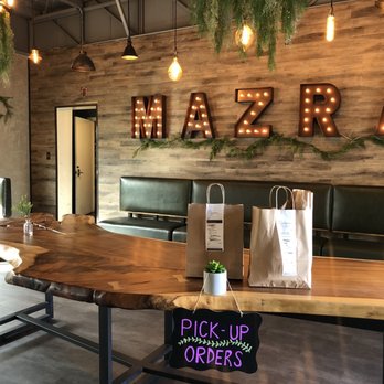 Mazra - Indoor dining space converted to covid-era pick-up area - Middle Eastern Near Me - San Bruno, California Mazra - Indoor dining space converted to covid-era pick-up area - Middle Eastern Near Me - San Bruno, California