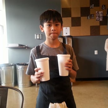 Social Burger - Young Ian serving drinks at Social Burger. His family owns the joint. - Burgers Near Me - Vienna, Virginia Social Burger - Young Ian serving drinks at Social Burger. His family owns the joint. - Burgers Near Me - Vienna, Virginia