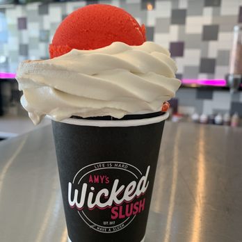 Wicked Slush Novato - Regular sized Split of cherry slush & butter pecan soft serve, perfect combination! - Ice Cream & Frozen Yogurt Near Me - Novato, California