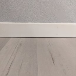 Gap in between floor and baseboard Gap in between floor and baseboard