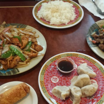 Happy China - Mongolian chicken (left), hot pepper chicken (right), steamed dumplings (yuck...) - Chinese Near Me - Springfield, Missouri Happy China - Mongolian chicken (left), hot pepper chicken (right), steamed dumplings (yuck...) - Chinese Near Me - Springfield, Missouri