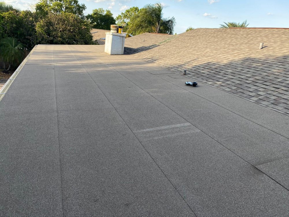 Slide of A2M Roofing