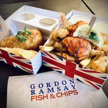 Gordon Ramsay Fish & Chip - (L) extra piece of chicken and fish; (R) Lobster & shrimp combo box w/ seasalt fries, tartar & mango curry sauce. - Seafood Near Me - Reno, Nevada Gordon Ramsay Fish & Chip - (L) extra piece of chicken and fish; (R) Lobster & shrimp combo box w/ seasalt fries, tartar & mango curry sauce. - Seafood Near Me - Reno, Nevada