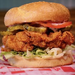 Hattie's Chicken Shack - Mouthwatering masterpiece features a perfectly golden and crispy fried chicken fillet nestled within a pillowy, toasted bun.