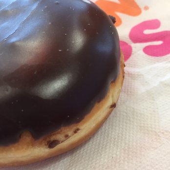 Dunkin' - a chocolate frosted donut on a napkin - Coffee & Tea Near Me - Andover, Minnesota Dunkin' - a chocolate frosted donut on a napkin - Coffee & Tea Near Me - Andover, Minnesota