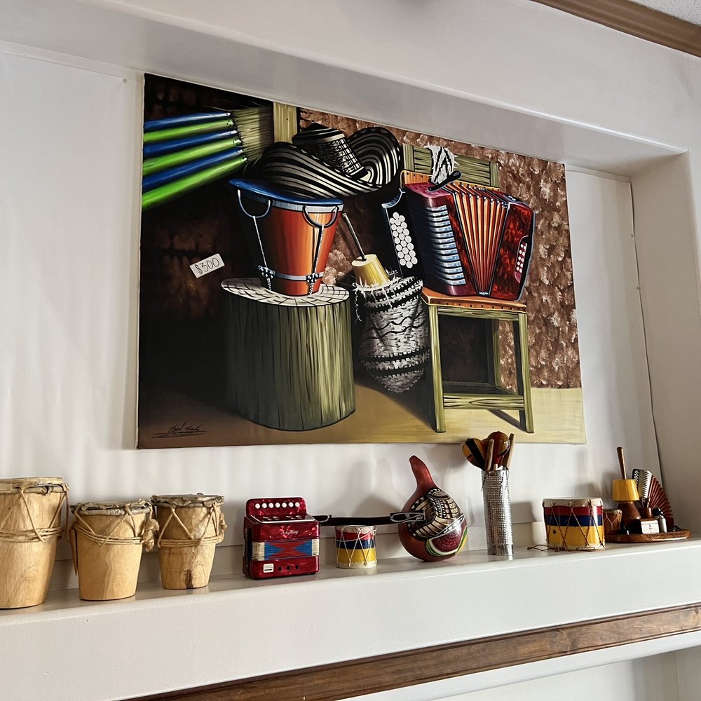 Bilu's Colombian Bakery - a painting of an accordion player - Bakeries Near Me - Virginia Beach, Virginia Bilu's Colombian Bakery - a painting of an accordion player - Bakeries Near Me - Virginia Beach, Virginia