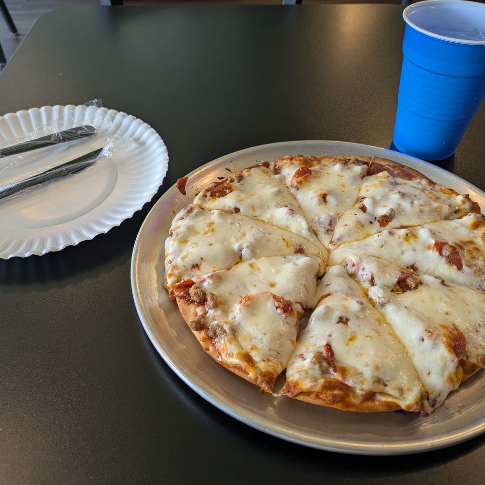 Pasquale's Newport - Pepperoni and sausage are lurking beneath the cheese. - Pizza Near Me - Newport, Kentucky Pasquale's Newport - Pepperoni and sausage are lurking beneath the cheese. - Pizza Near Me - Newport, Kentucky