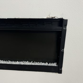 Premium Fireplace & Accent Wall Designs - This is the way they cut the wall to put the fire place in and thought it was ok because the glass covering to the fireplace would cover it. - Fireplace Services Near Me - Temecula, California Premium Fireplace & Accent Wall Designs - This is the way they cut the wall to put the fire place in and thought it was ok because the glass covering to the fireplace would cover it. - Fireplace Services Near Me - Temecula, California