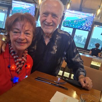 Dear Olivia Bar & Kitchen - Nancy, the writer of this review & Les - American Near Me - Parkland, Florida Dear Olivia Bar & Kitchen - Nancy, the writer of this review & Les - American Near Me - Parkland, Florida