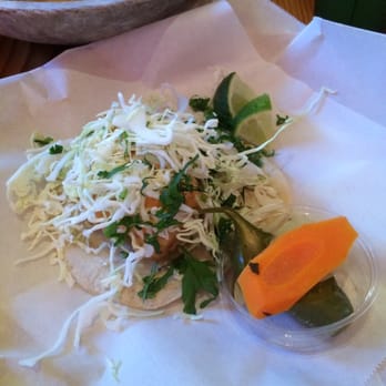 Tacubaya - Fish Taco. One piece of fish grated cabbage and aioli sauce in a flour tortilla. Side of pepper and carrot - Mexican Near Me - Berkeley, California Tacubaya - Fish Taco. One piece of fish grated cabbage and aioli sauce in a flour tortilla. Side of pepper and carrot - Mexican Near Me - Berkeley, California