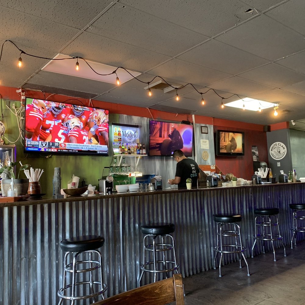 La Lupe Mexican Restaurant - a bar with stools - Mexican Near Me - Pompano Beach, Florida La Lupe Mexican Restaurant - a bar with stools - Mexican Near Me - Pompano Beach, Florida