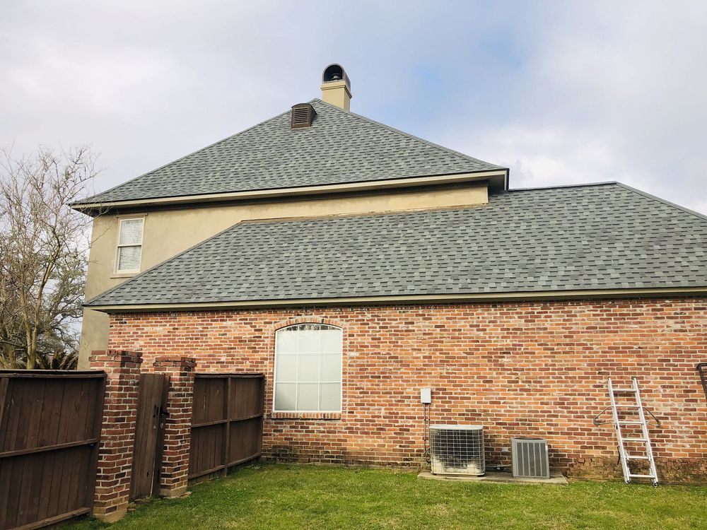 Slide of Pelican Roofing Company