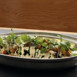 From the resto IG page.  cold green bean salad... bomb-ass (good)