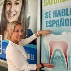 MiraMar Family Dental - Patient in front of MiraMar Family Dental clinic