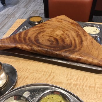 Saravanaa Bhavan - Mysore masala dosa, a *huge* crepe-like, thin wrapper around a delicious potato filling - Indian Near Me - Plano, Texas Saravanaa Bhavan - Mysore masala dosa, a *huge* crepe-like, thin wrapper around a delicious potato filling - Indian Near Me - Plano, Texas