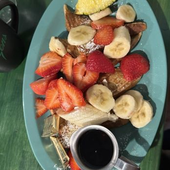 Dozens - Le Toast Francais with strawberries and bananas - Breakfast & Brunch Near Me - Denver, Colorado Dozens - Le Toast Francais with strawberries and bananas - Breakfast & Brunch Near Me - Denver, Colorado