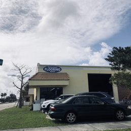 a car parked in front of the store