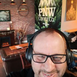 Fireplace, nice lighting, comfortable place to meet, and a certified photo of a happy customer! Fireplace, nice lighting, comfortable place to meet, and a certified photo of a happy customer!