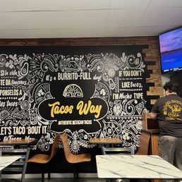 Dine in area and an ad for a burger joint as well.