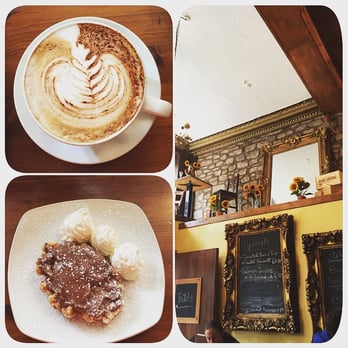 Saint Giles Cafe Bar - Mocha coffee, chocolate Belgian waffle, and the interior wall. - Coffee & Tea Near Me - Edinburgh, EDH