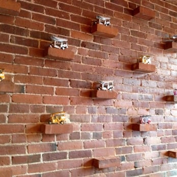 The Taste Thai Restaurant - a brick wall with a variety of asian food items on it - Thai Near Me - Amherst, Massachusetts The Taste Thai Restaurant - a brick wall with a variety of asian food items on it - Thai Near Me - Amherst, Massachusetts