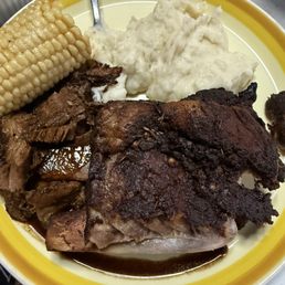 Brisket, Baby back ribs, corn on the cob and homemade mashed potatoes Brisket, Baby back ribs, corn on the cob and homemade mashed potatoes