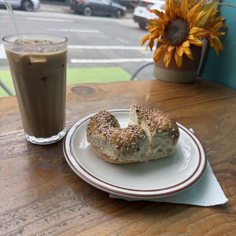 Beluna Cafe - Iced coffee with milk and an everything bagel - Themed Cafes Near Me - San Francisco, California Beluna Cafe - Iced coffee with milk and an everything bagel - Themed Cafes Near Me - San Francisco, California