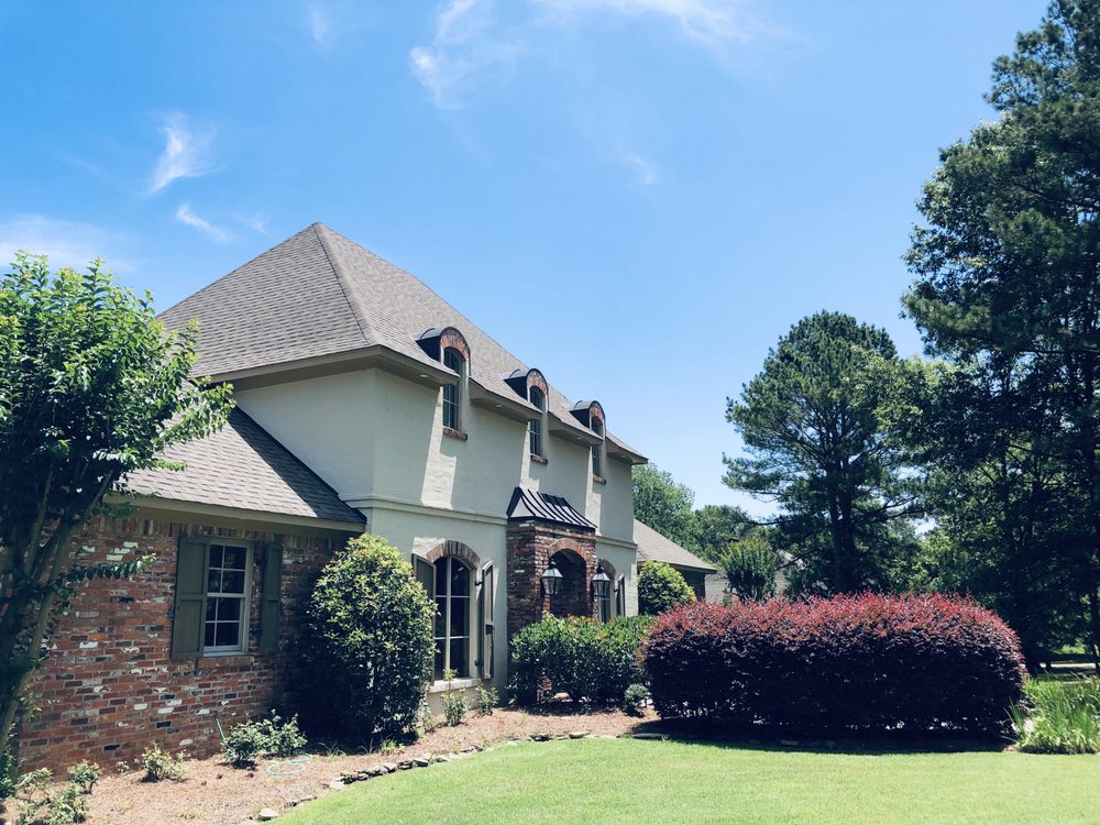 Slide of American Roofing and Construction