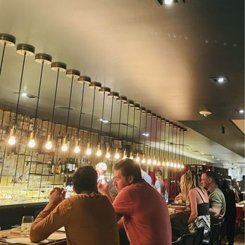 Rioja - The bar area, which is quite sophisticated and nice with the Edison gas-styled lighting. - New American Near Me - Denver, Colorado Rioja - The bar area, which is quite sophisticated and nice with the Edison gas-styled lighting. - New American Near Me - Denver, Colorado