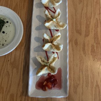 Cody's Cafe and Bar - Spinach cheese wontons - Italian Near Me - Denver, Colorado Cody's Cafe and Bar - Spinach cheese wontons - Italian Near Me - Denver, Colorado