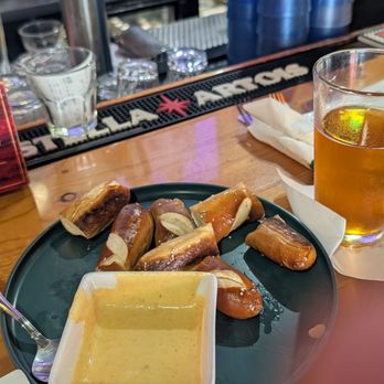 Dixie Grill & Bar - Off the appetizer menu fresh pretzel with beer cheese - American Near Me - West Palm Beach, Florida