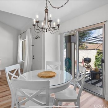 Pride Construction & Remodeling - a dining room with sliding glass doors - General Contractors Near Me - Bell Canyon, California