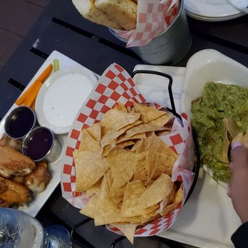 Bourbon Street - Chicken wings and guacamole and chips - Cajun/Creole Near Me - Bayside, New York