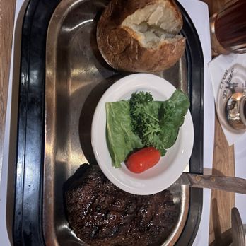 Club Paris - Filet mignon with baked potato - Steakhouses Near Me - Anchorage, Alaska Club Paris - Filet mignon with baked potato - Steakhouses Near Me - Anchorage, Alaska