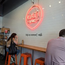 a man and a woman sitting at a counter a man and a woman sitting at a counter
