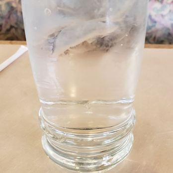 Omicron Family Restaurant - a glass of water on a table - American Near Me - West Bend, Wisconsin Omicron Family Restaurant - a glass of water on a table - American Near Me - West Bend, Wisconsin