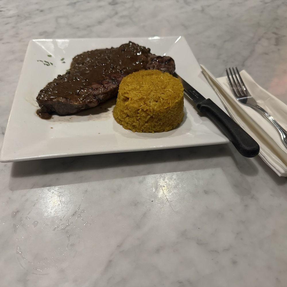 Ponty Bistro - Sirloin steak with seasoned rice - French Near Me - New York, New York Ponty Bistro - Sirloin steak with seasoned rice - French Near Me - New York, New York