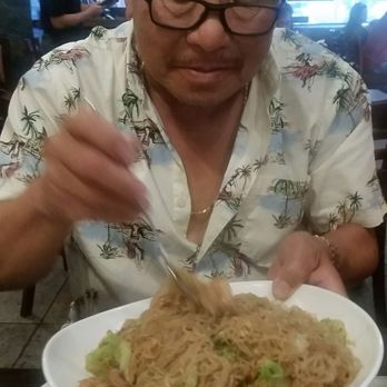 Gerry's Grill - Dad digging into the pancit bihon - Filipino Near Me - Artesia, California Gerry's Grill - Dad digging into the pancit bihon - Filipino Near Me - Artesia, California