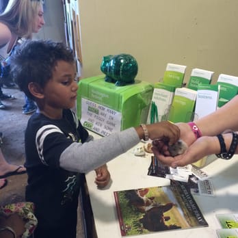 Clark County Fair and Rodeo - Petting baby chick - Rodeo Near Me - Logandale, Nevada