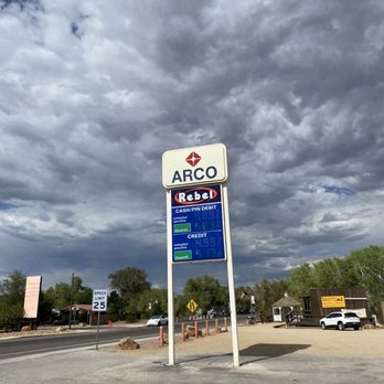 Arco - a gas station with a cloudy sky in the background - Gas Stations Near Me - Beatty, Nevada Arco - a gas station with a cloudy sky in the background - Gas Stations Near Me - Beatty, Nevada