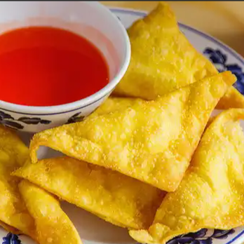 Kim Bo Chinese Restaurant - a plate of food with a bowl of sauce - Chinese Near Me - Cocoa Beach, Florida
